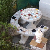 Outside seating, braai & parking for the unit 